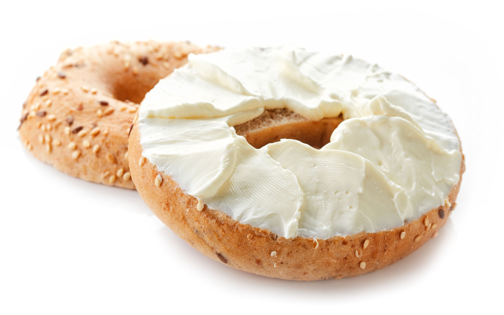 Sesame bagel with cream cheese close-up